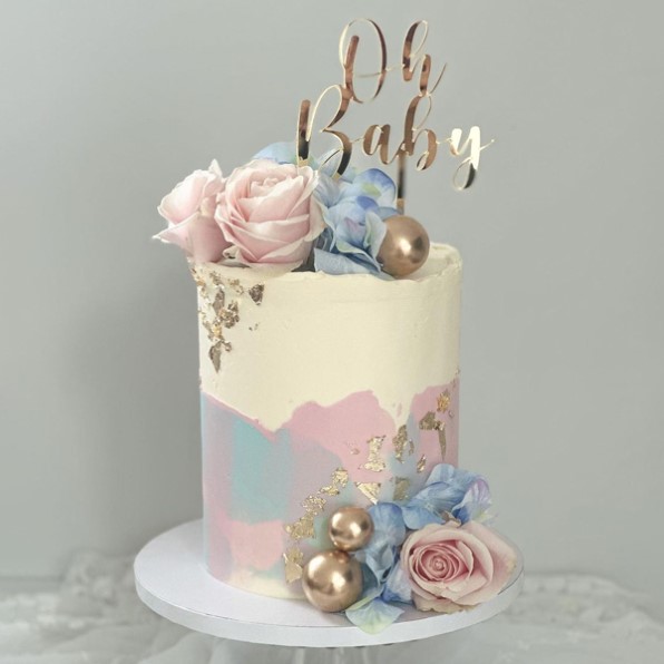 pastel de revelación de género con azul pastel y rosa